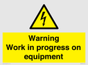 warning-work-in-progress-on-equipmentwith-electrical-hazard-symbol~